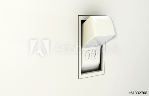Isolated Wall Light Switch In The On Position